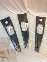 Three packaged carbon fiber pattern panels