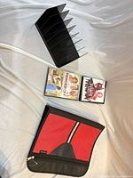 Full lot view: organizer, folder, two DVDs