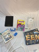 Group shot of all items laid out: planner, book, banner, accessories