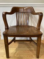 Front angled view showing overall form of chair