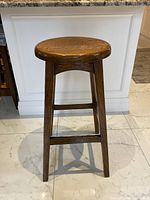 Full view of oak tavern stool front angle