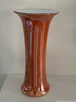 Full view of vase front showing iridescent copper finish and shape