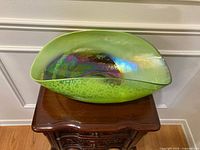 Top view showing overall shape, color gradation, and iridescent interior