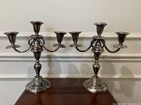 front view of both matching candelabra showing three light arrangement