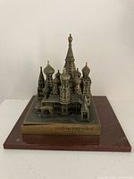 Full view of bronze cathedral model on marble base