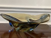 Side profile showing organic sculptural form and layered colors