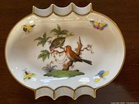 full view of oval ashtray showing pattern and shape