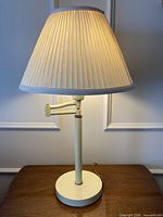 Lamp illuminated to show working condition, full view with shade