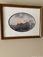 full view of framed painting on wall