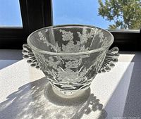 Top view showing etched floral motif inside bowl