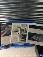 Stacked view of four typewriter ads