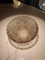 Top view showing interior embossed designs and gold accents