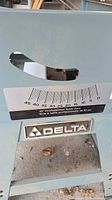 Front view of steel stand showing Delta logo and scale decal