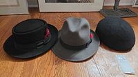 Overview of three hats in lot