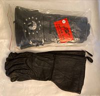 Both glove pairs, Jafrum pair in package, Barrie glove below