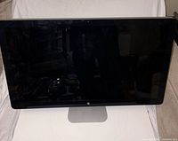 Front view of Apple iMac showing 27-inch screen and stand