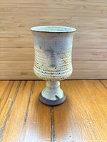 Front view of stoneware goblet showing glaze and shape