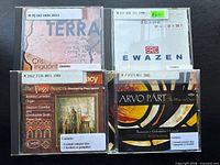 Front covers of all four CDs in jewel cases