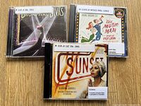 Front covers of the three CDs