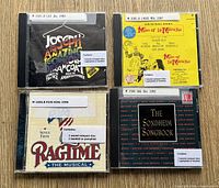 Front view of four musical theatre CD cases