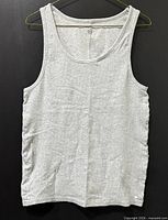 Full front view of light gray ribbed tank top on hanger