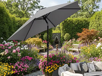 Umbrella opened in garden setting
