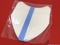 Front view of sealed pack showing sticker shape and blue alignment strip