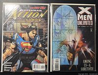 Front covers of both comic books in bags