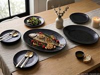 Platter and plates displayed on table