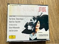 Front view of CD jewel case showing cover art, label, soloists list and booklet notice