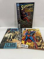 Group photo of three bagged DC comic books