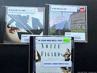 Front covers of the three CD cases