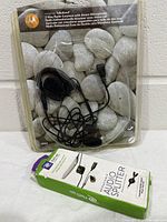 Front view of Motorola earpiece and boxed ReTrak splitter