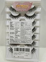 Front view of retail package showing seven pairs of eyelashes and JIMIRE logo