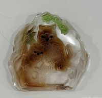 Front view of molded glass owl figurine