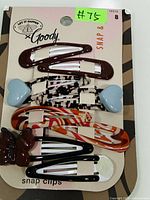 Front view full card with eight Goody snap clips