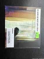 Front of gatefold digipak with album title, artist name, library label indicating 1 sound compact disc and booklet