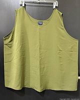 Full front view of olive green tank top on hanger