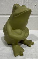 Front view of matte olive green ceramic frog planter