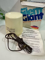 Pump with cord, box, instructions visible