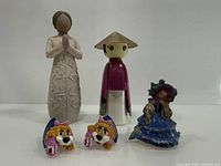 Group shot of all five figurines