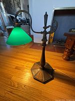 Full view of banker’s lamp showing green shade, column and base