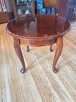 Full view of round mahogany side table