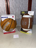 Both boxed balls side by side showing fronts