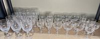 Full set of stemware lined up showing quantity and style