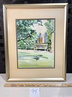 Framed watercolor with ruler for scale