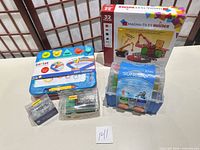 All five boxed items grouped on table