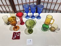 Group shot showing all 13 glass pieces on table