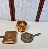 Group view of all three copper/brass pieces