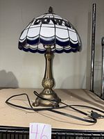 Full view of lamp with cord and plug visible